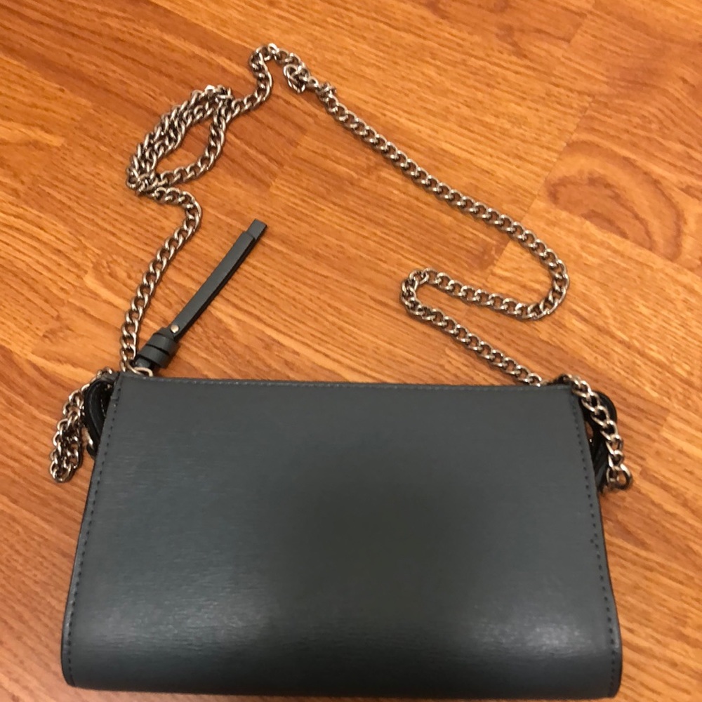 Blue crossbody purse with silver chain